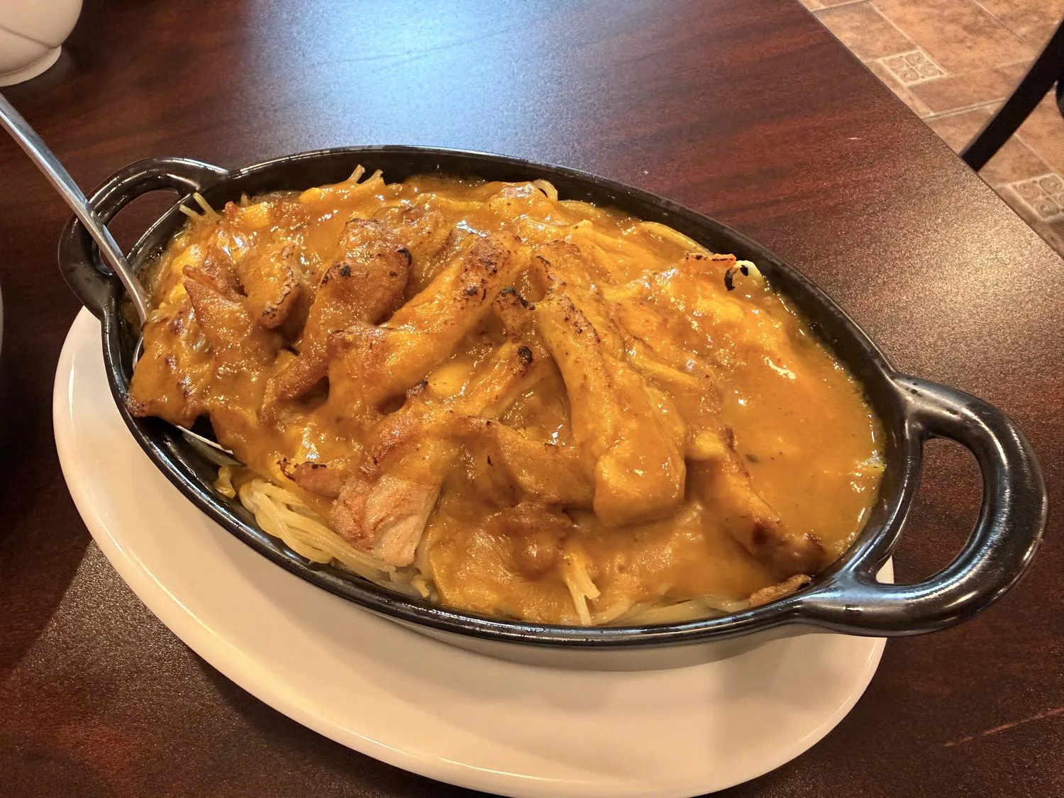 Baked pork with curry and noodles at Destination Café E Ramen, a Hong Kong-Style Cafe in Chicago