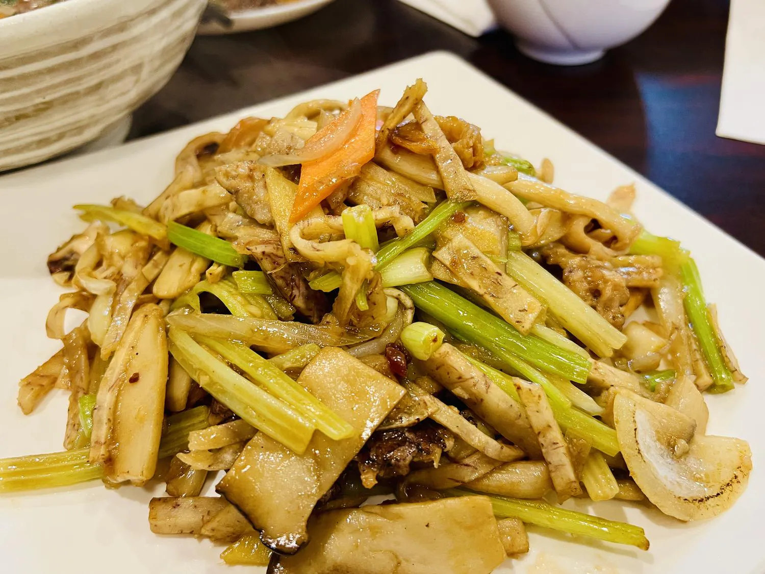 Stir-fried mushrooms with celery and meat at Destination Café E Ramen, a Hong Kong-Style Cafe in Chicago
